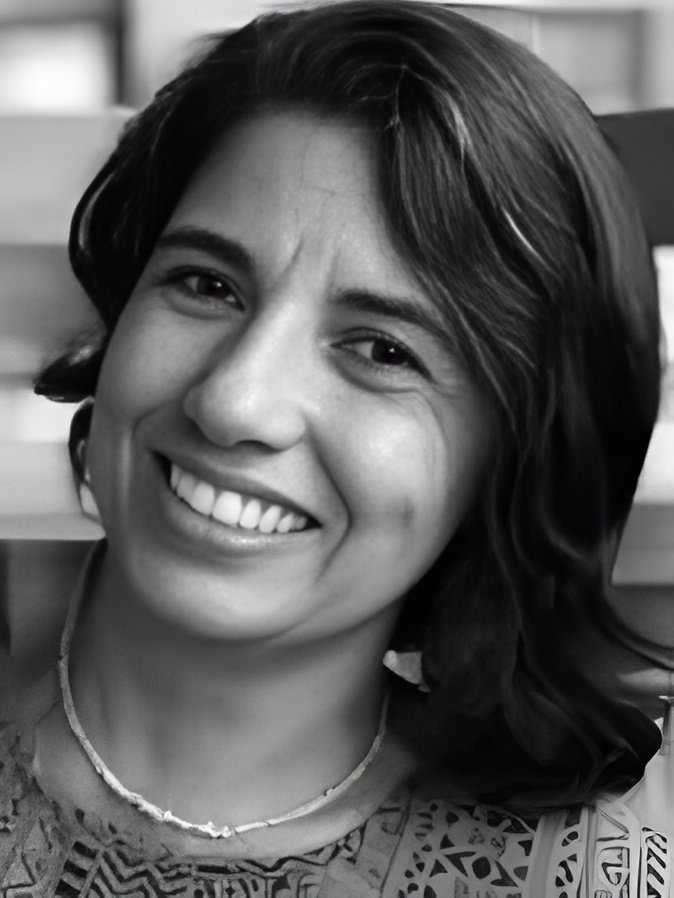 Close-up smiling woman in black and white